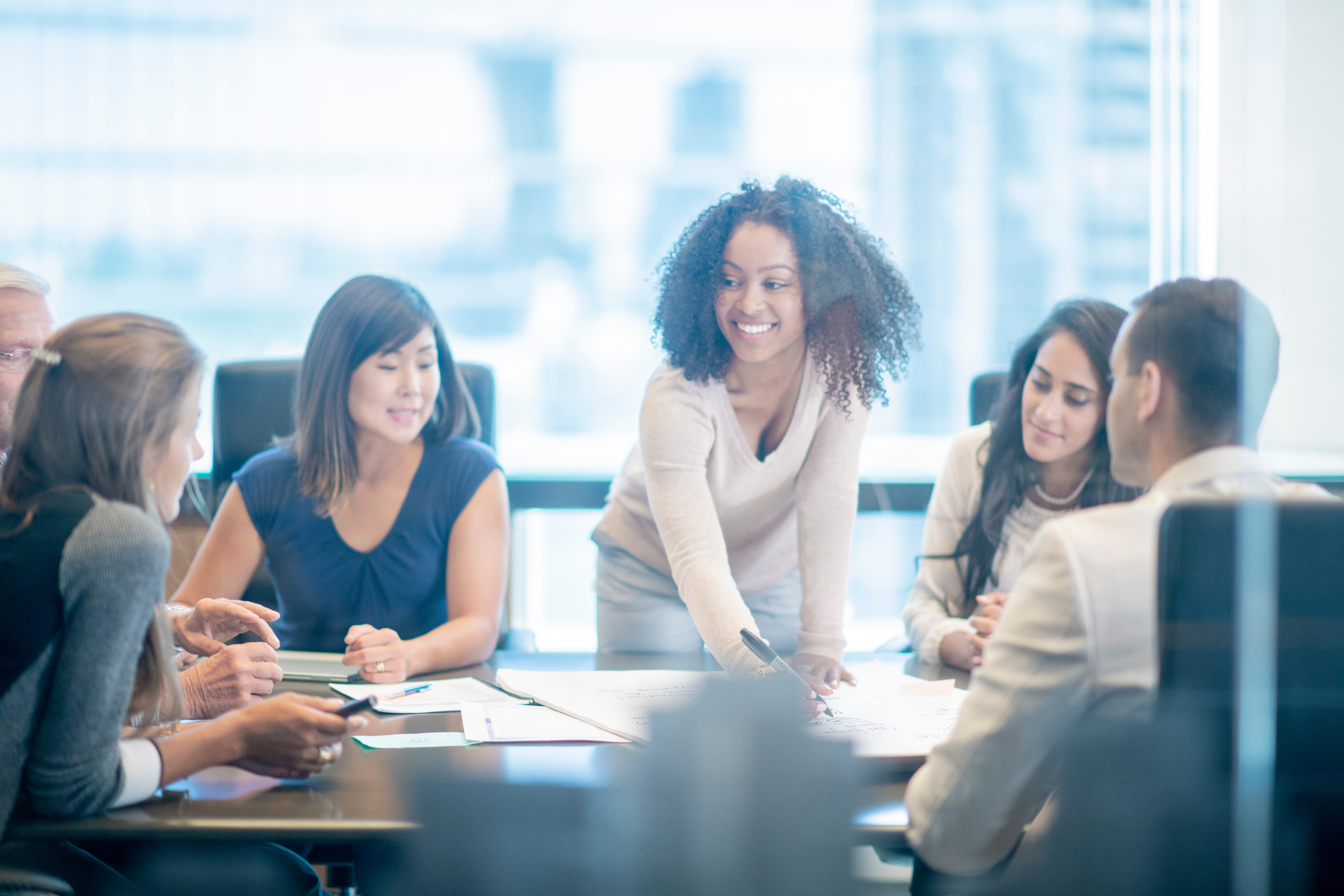 Female executive leading a meeting